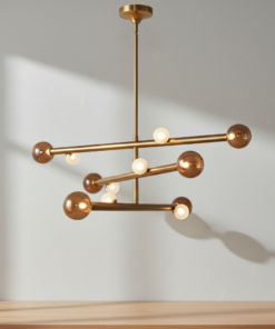 Reese 47.5-Inch LED Chandelier in Vintage Brass and Amber Glass by Kuzco Lighting